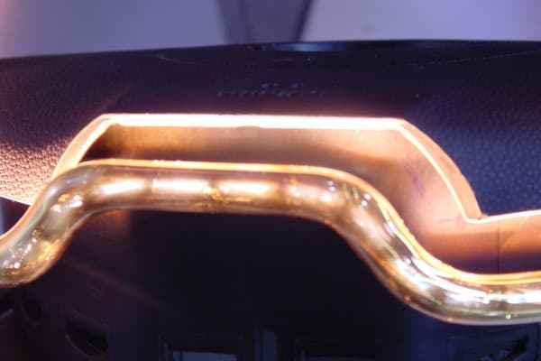 A contoured emitter following the edge of the part